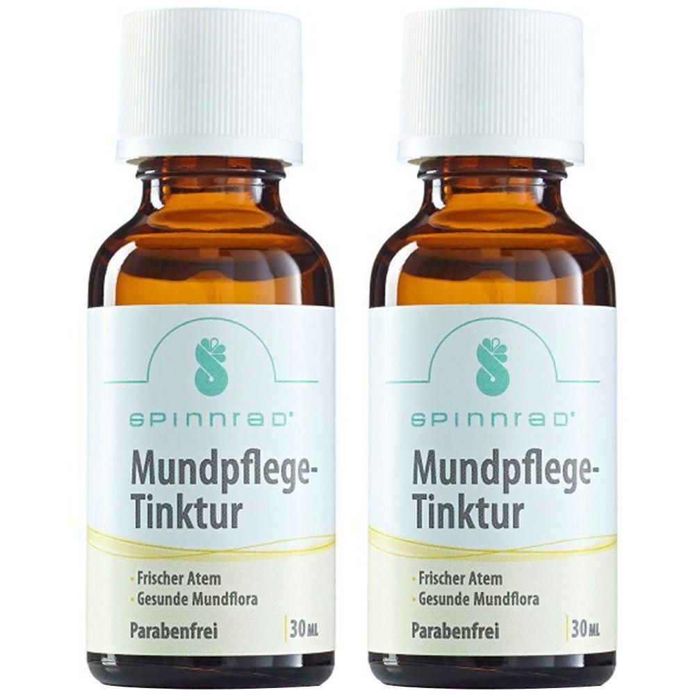 Zwei braune Glasflaschen mit weißem Deckel. Auf dem Etikett steht "Spinnrad Mundpflege-Tinktur". Weitere Angaben: "Frischer Atem, Gesunde Mundflora, Parabenfrei".