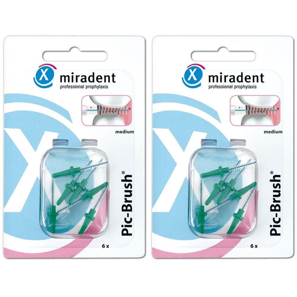 Zwei Packungen miradent Pic-Brush Ersatzbürsten. Jede Packung enthält sechs grüne Bürsten in einer Blisterverpackung.