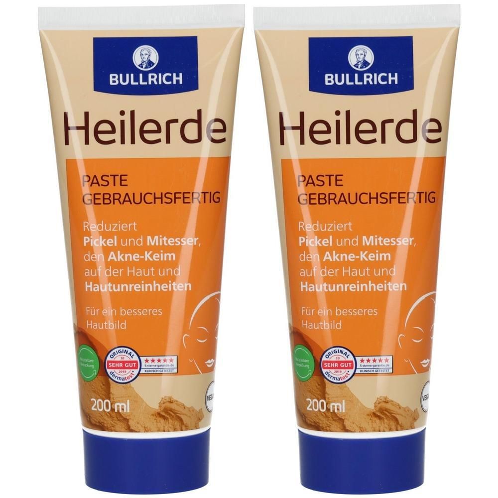 Zwei Tuben mit Produktaufdruck. Aufschrift: Bullrich Heilerde Paste. Orangefarbenes Design mit blauer Schrift und Verschluss.