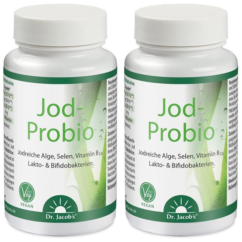Zwei weiße Flaschen mit grünem Etikett. Aufschrift: Jod-Probio, Jodreiche Alge, Selen, Vitamin B12, Lakto- & Bifidobakterien. Vegan-Siegel. Dr. Jacob's.