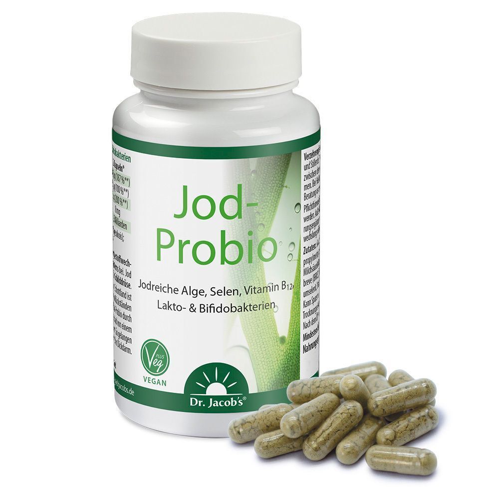 Eine weiße Flasche mit grünem Etikett und Kapseln daneben. Aufschrift: Jod-Probio, Jodreiche Alge, Selen, Vitamin B12, Lakto- & Bifidobakterien. Vegan. Dr. Jacob's.