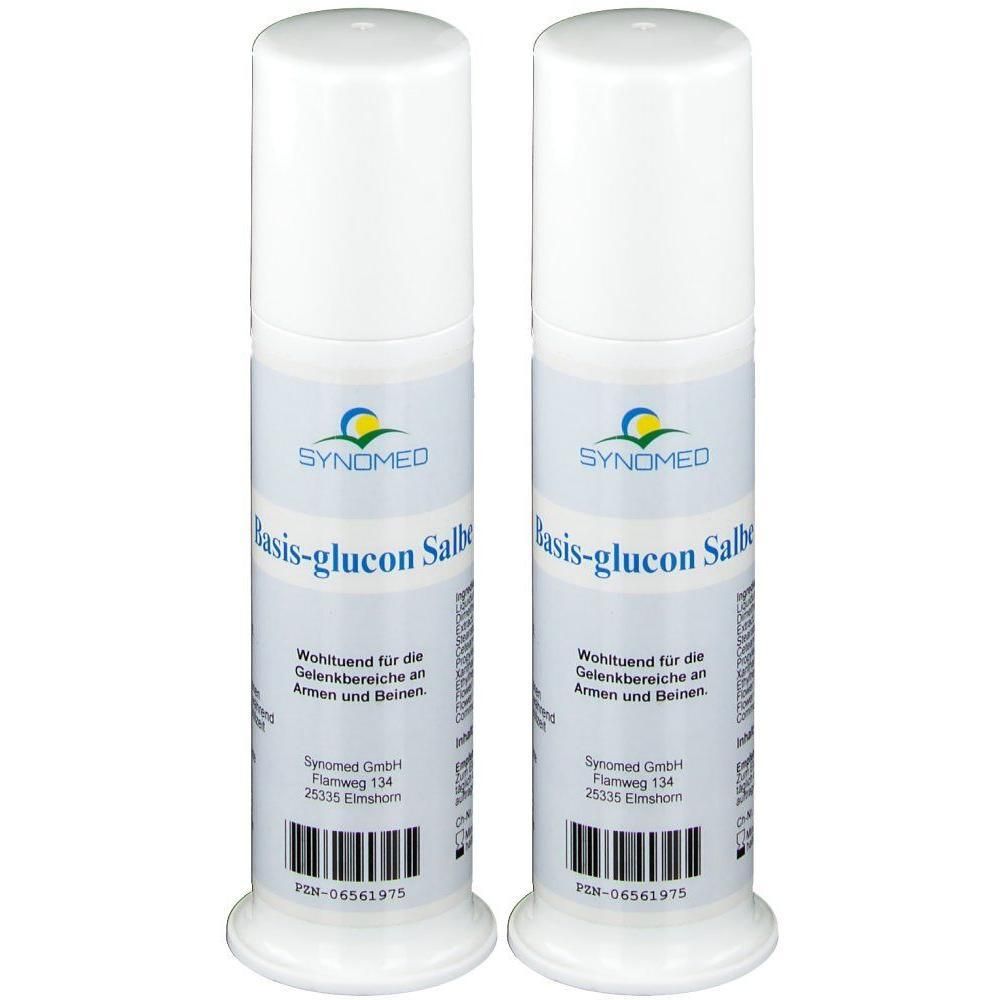 Zwei weiße Flaschen BASIS GLUCON Salbe. Aufschrift: SYNOmed, Basis-glucon Salbe. Barcode und weitere Informationen.