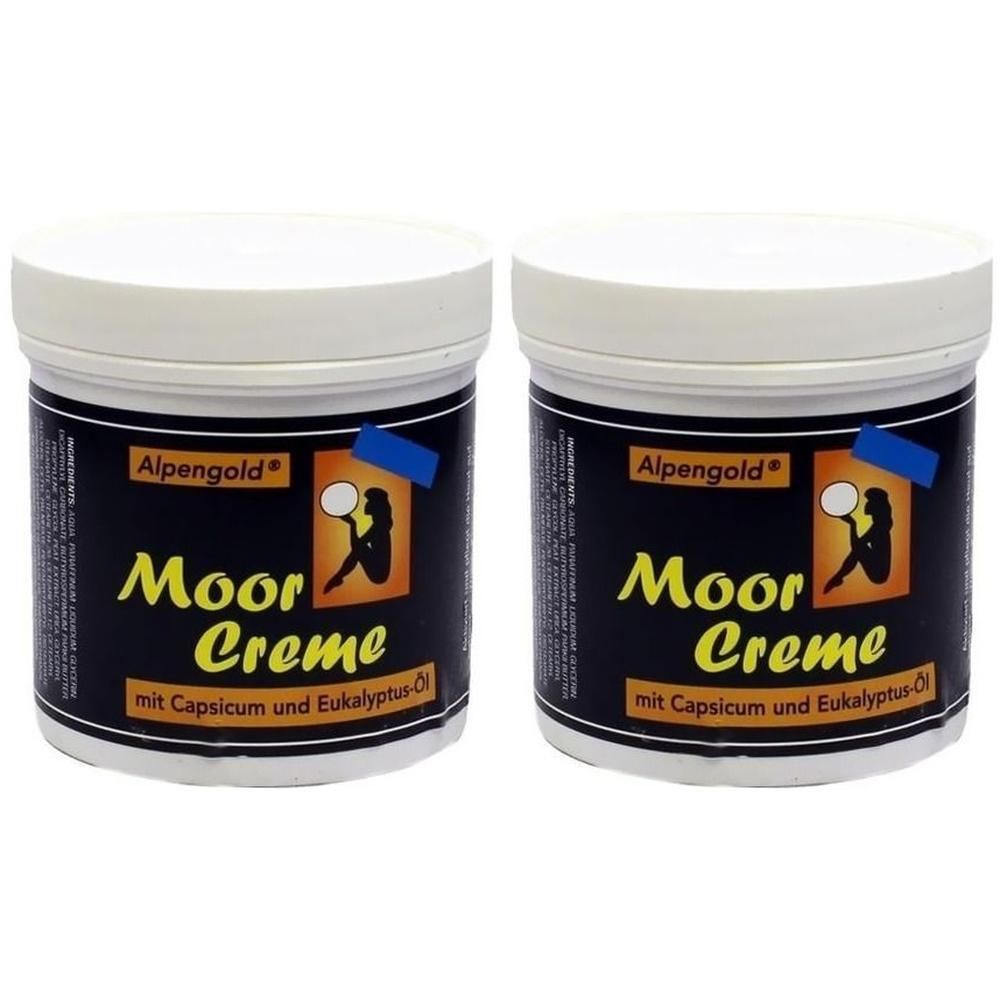 Zwei Tiegel mit weißem Deckel. Schwarzes Etikett mit gelbem Schriftzug "Moor Creme" und Logo. Text: "mit Capsicum und Eukalyptus-Öl".