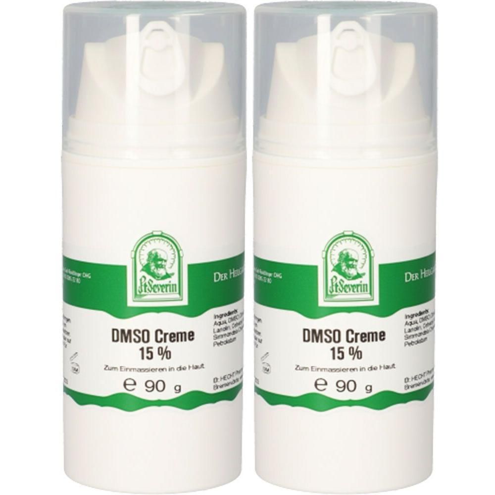 Zwei weiße Cremetuben mit grünen Etiketten. Aufschrift: DMSO Creme 15 %. Klare Deckel. E 90 g.