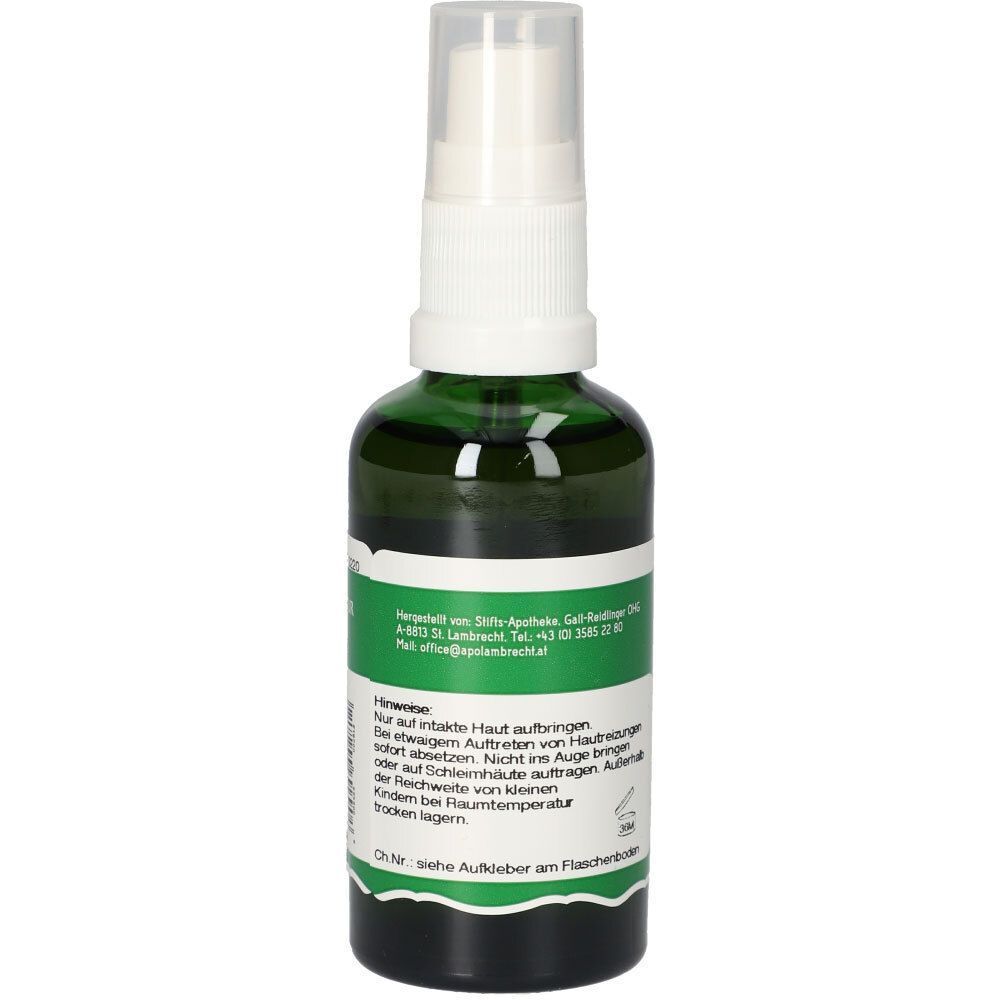 Grüne Sprühflasche mit weißem Sprühkopf. Etikett mit Text und Hinweisen. Rückansicht.