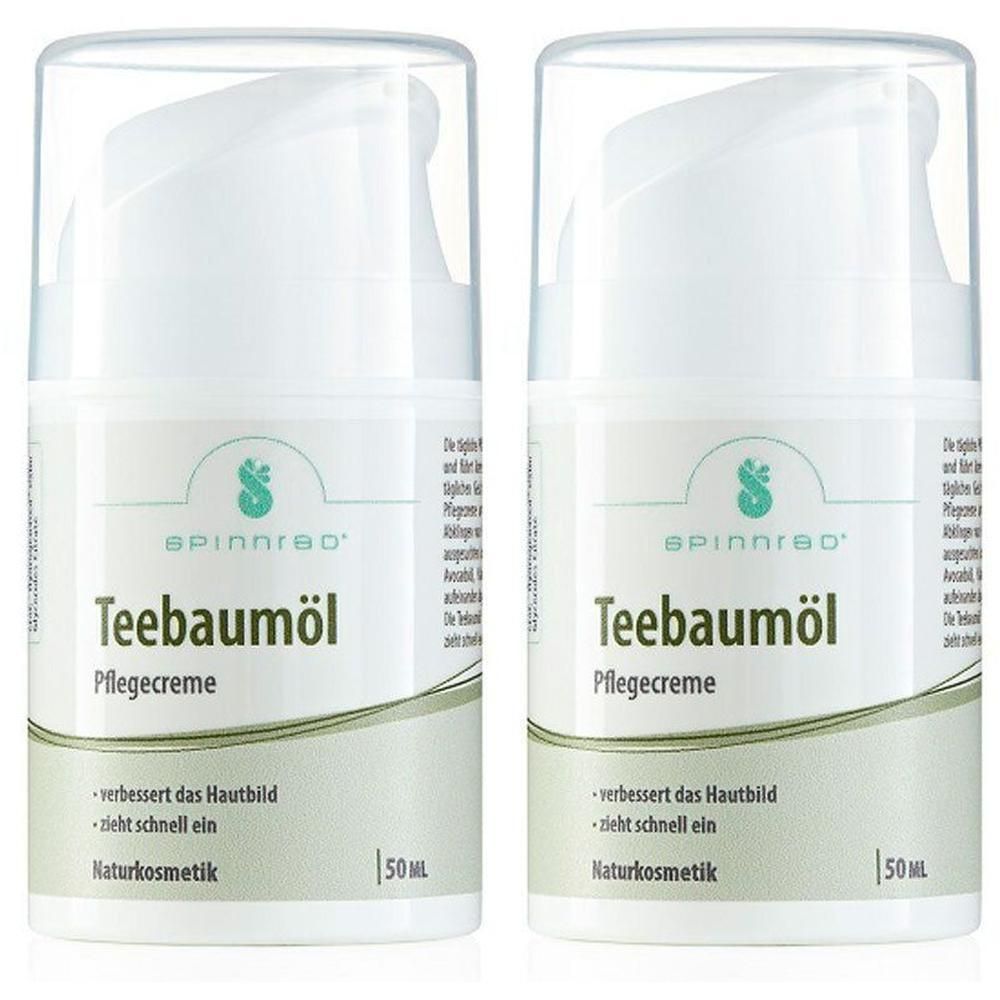 Zwei weiße Spinnrad-Flaschen mit Teebaumöl Pflegecreme-Etikett. Aufschrift: verbessert das Hautbild, zieht schnell ein, Naturkosmetik. 50 ml.