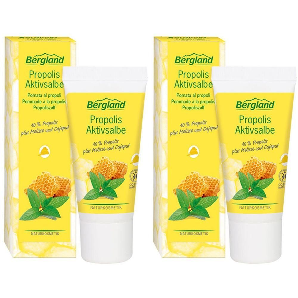 Zwei Tuben und Schachteln mit Produktaufdruck. Aufschrift: Bergland Propolis Aktivsalbe. Abbildung von Bienenwabe und Blättern.