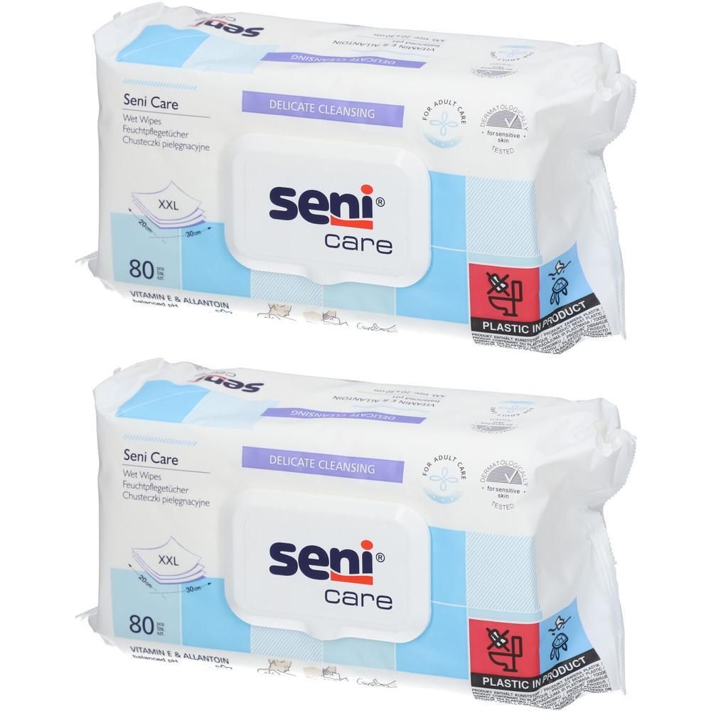 Zwei Packungen Seni Care Feuchttücher. Weiße Verpackung mit blauem und lila Design. Aufschrift: Seni Care, 80 Tücher, Delicate Cleansing.