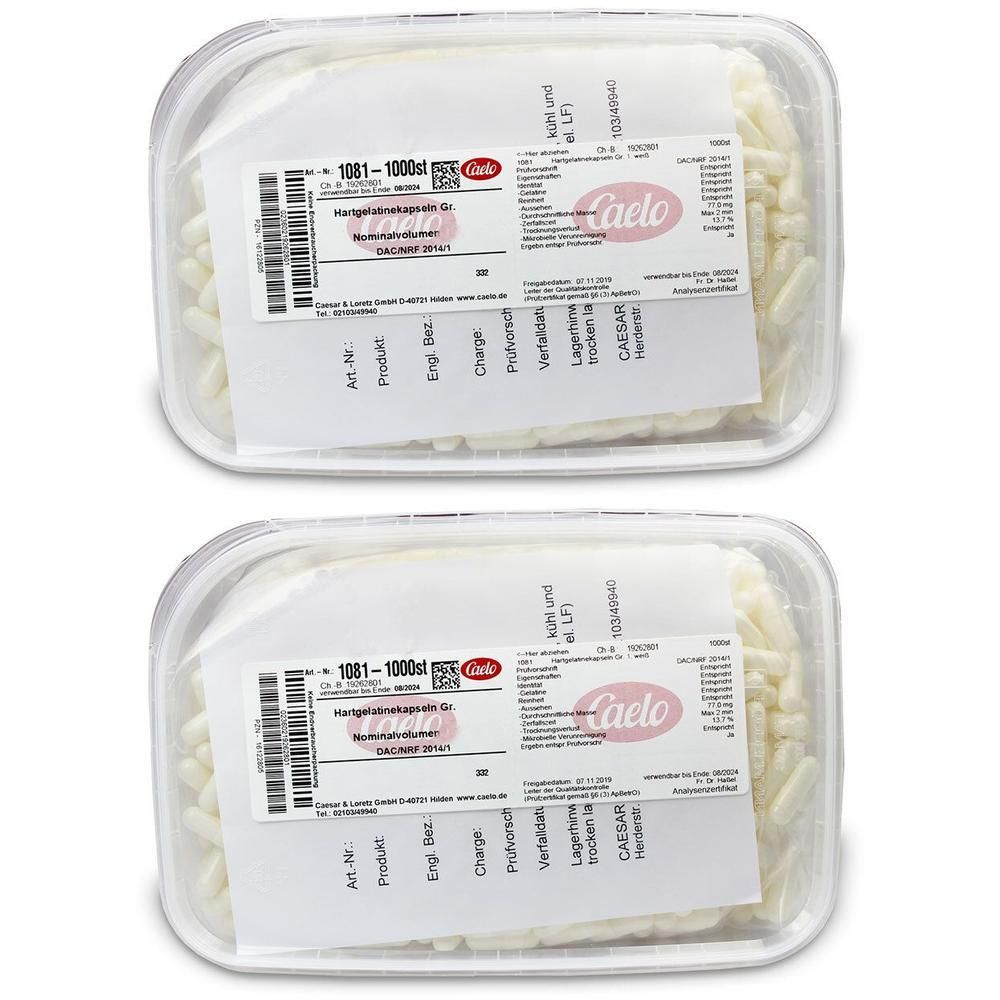 Zwei Packungen Hartgelatine Kapseln Gr. 0, weiß, in transparenten Kunststoffbehältern. Etiketten mit Produktinformationen.