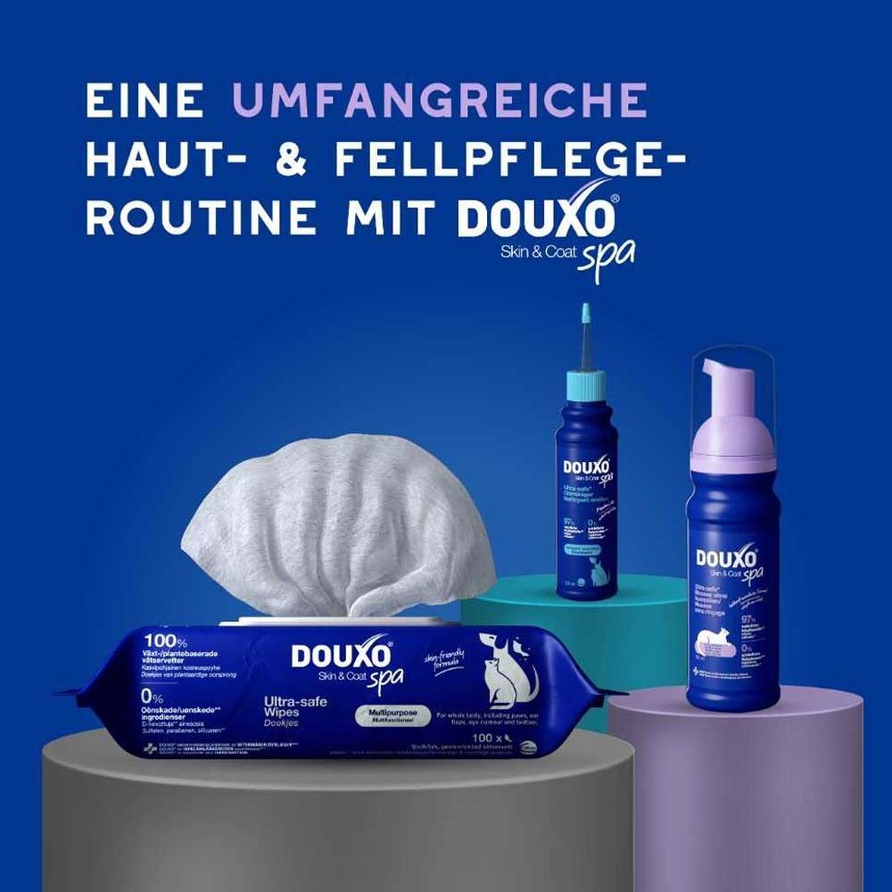 DOUXO® SPA Produkte: Trockenshampoo, Tücher und eine weitere Flasche. Text: Eine umfangreiche Haut- & Fellpflege-Routine.