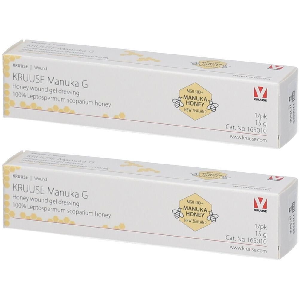 Zwei rechteckige Kartons mit Produktaufdruck. Aufschrift: KRUUSE Manuka G, Honig-Wundgelverband. Mit Manuka Honey-Logo und 15 g.