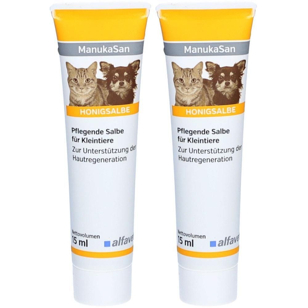 Zwei Tuben Salbe für Kleintiere. Aufschrift: ManukaSan, Honigsalbe. Enthält Abbildungen von Katze und Hund. Weiße Tube mit gelbem Deckel.