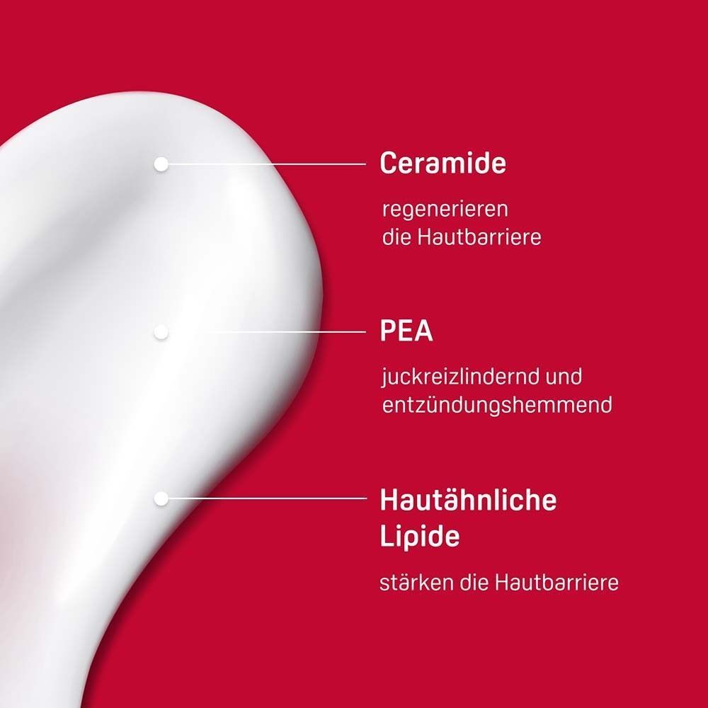 Nahaufnahme einer weißen Lotion mit Beschriftungen für Ceramide, PEA und Lipide.