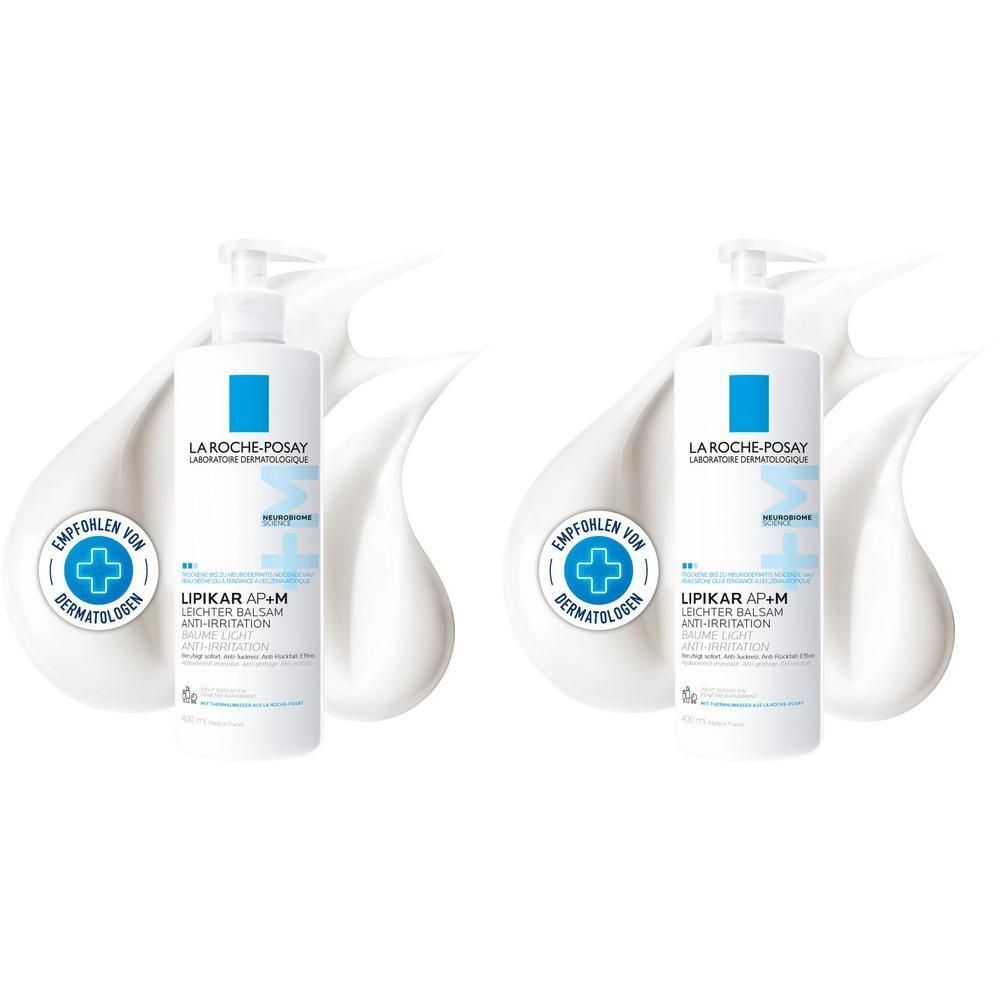 Zwei weiße Pumpflaschen La Roche Posay Lipikar Balsam AP+M mit weißer Creme-Textur.