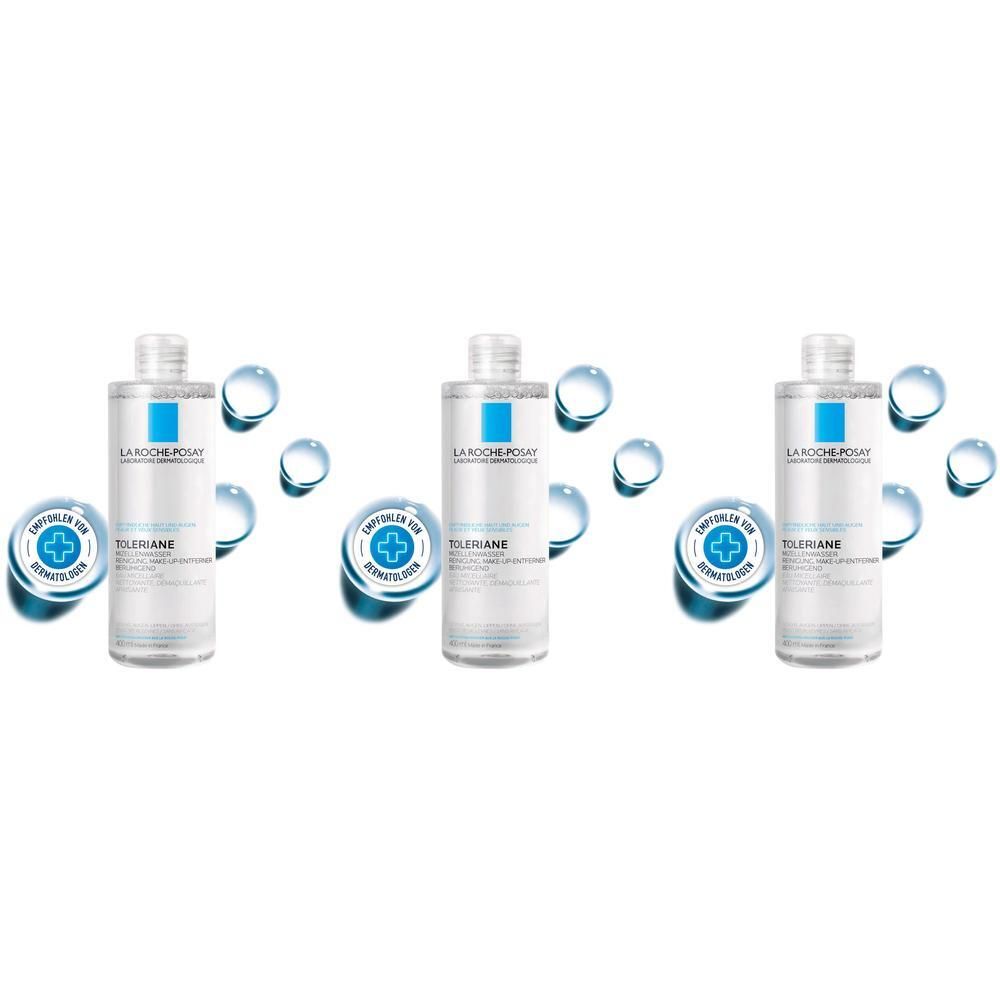 Drei Flaschen La Roche Posay Mizellen Reinigungsfluid mit Wassertropfen-Dekoration.