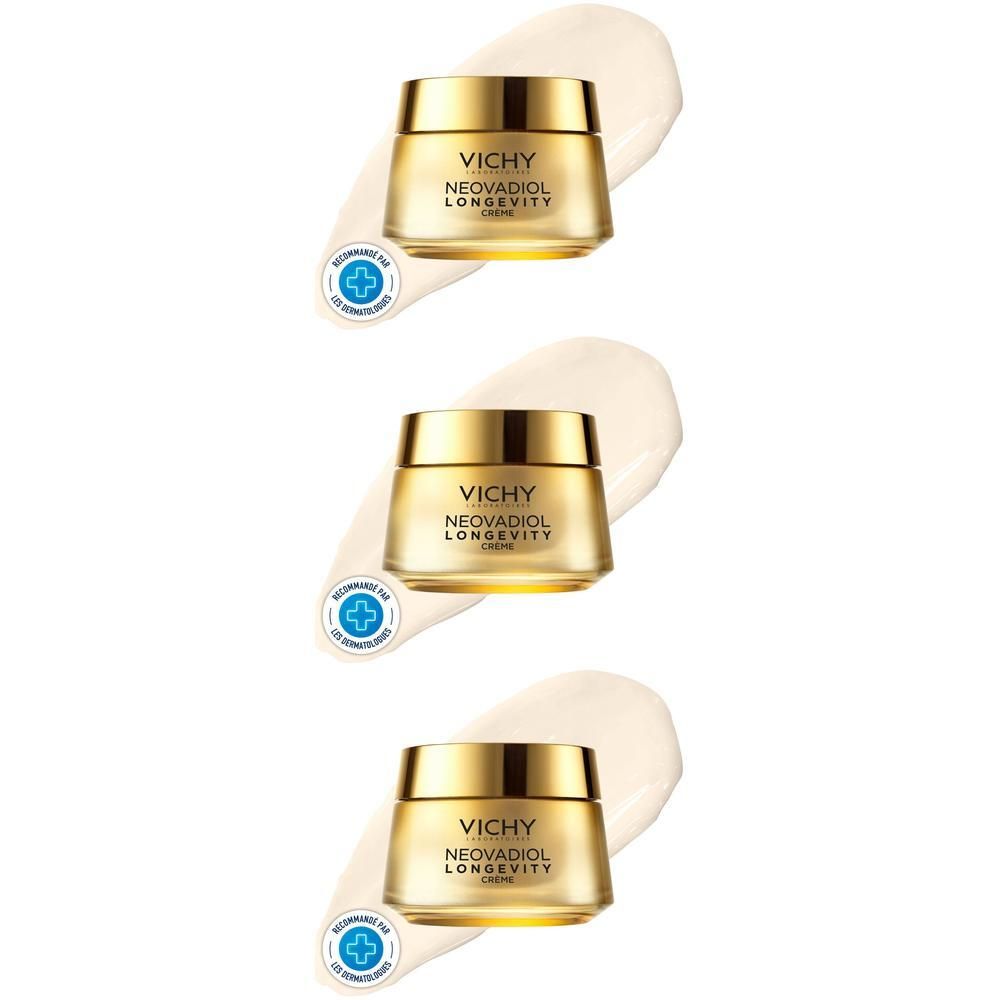 Drei goldene Vichy Neovadiol Longevity Creme Tiegel auf weißem Cremetupfer.