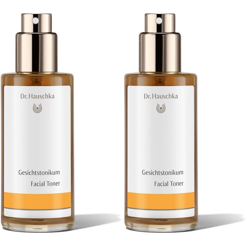 Zwei Dr. Hauschka Gesichtstonikum Flaschen mit Sprühkopf und Etikett.