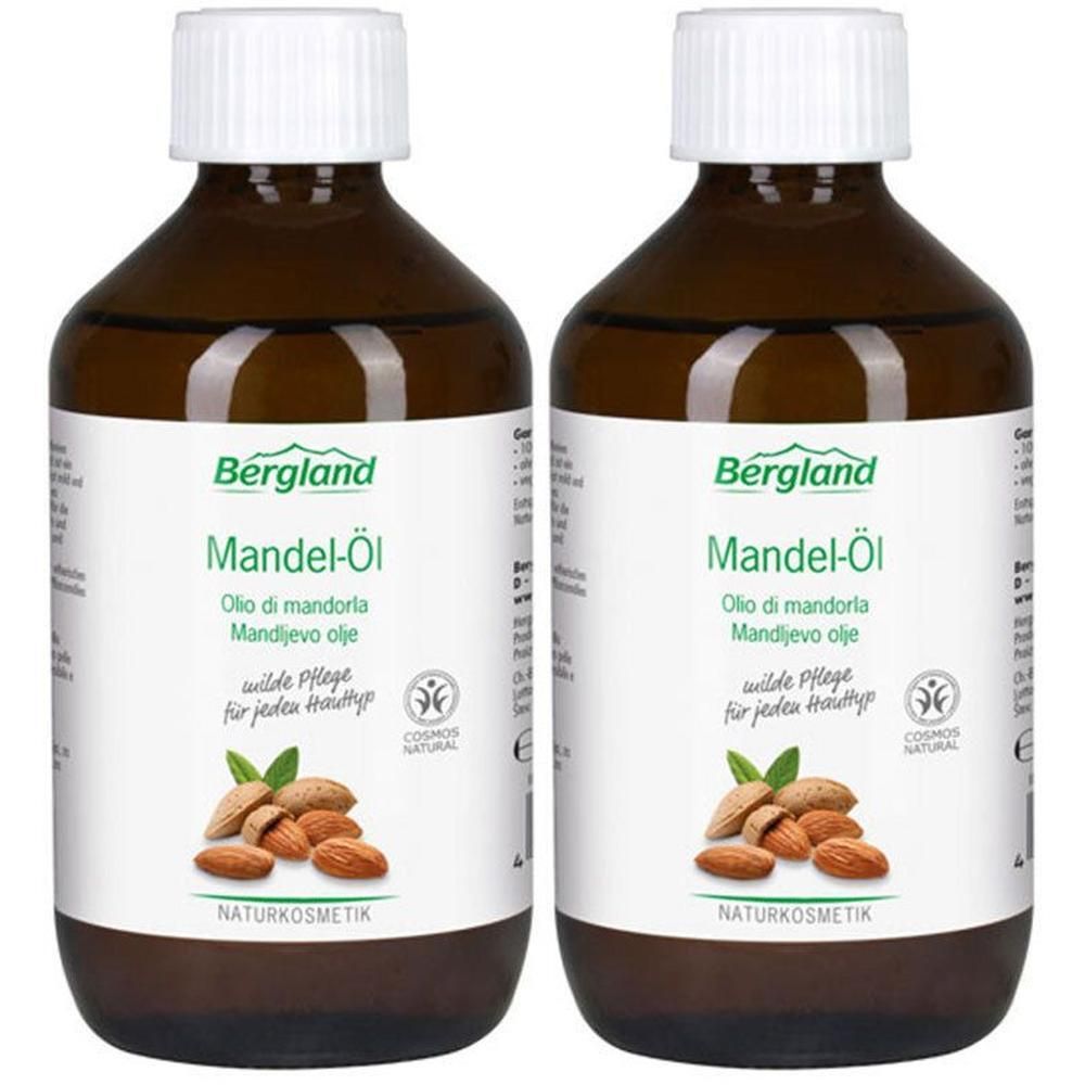Zwei Flaschen Bergland Mandel-Öl mit weißen Schraubverschlüssen. Naturkosmetik.
