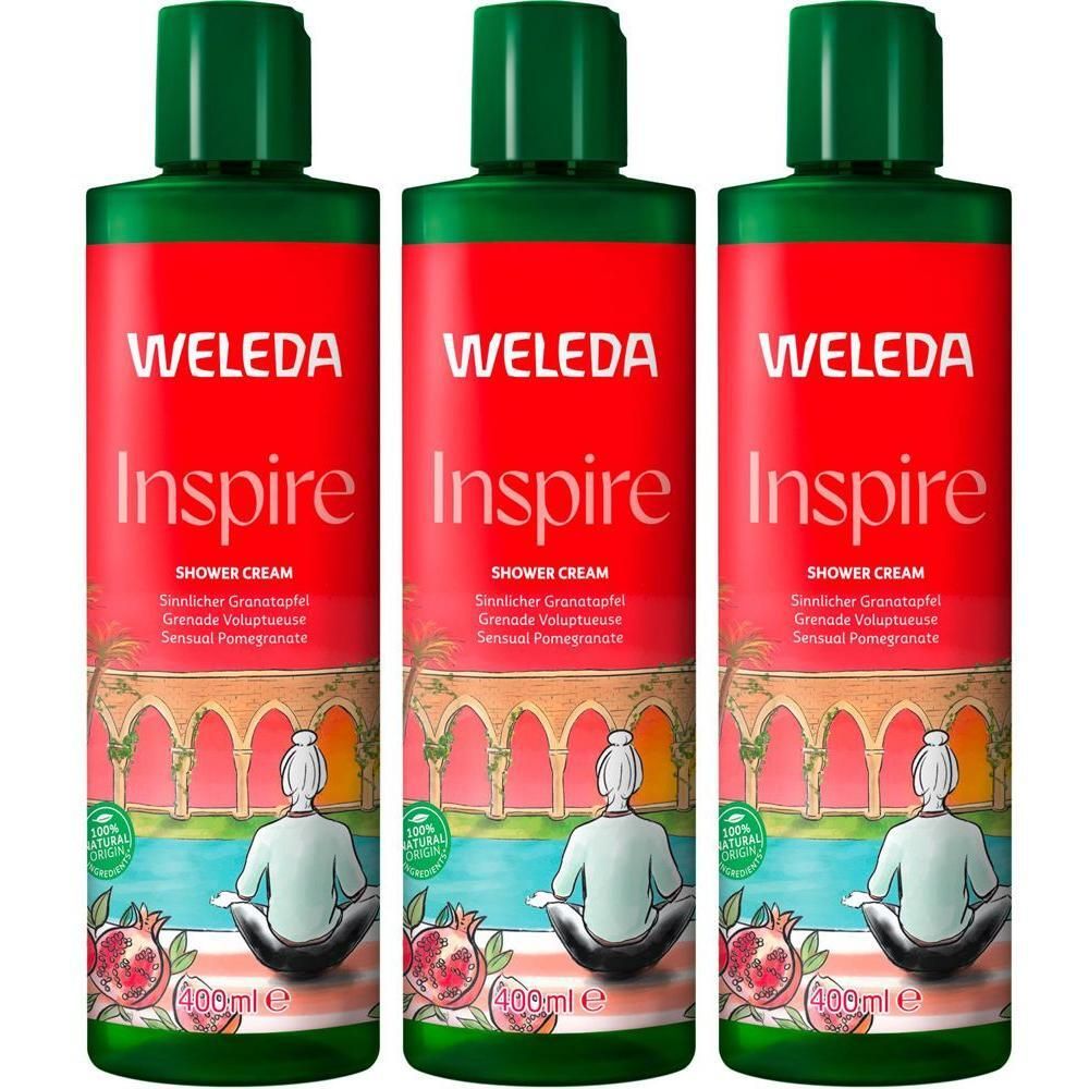 Drei Flaschen WELEDA Inspire Duschcreme Granatapfel mit grünen Verschlüssen und Etiketten, die eine Szene mit einer Person in Meditationshaltung zeigen.
