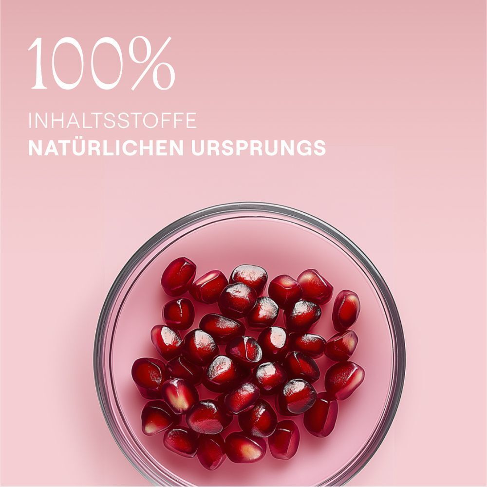 Eine Schale mit Granatapfelkernen, daneben der Text '100% Inhaltsstoffe natürlichen Ursprungs'.