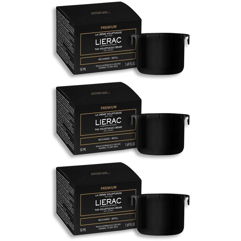 Drei Nachfüllpackungen der LIERAC Premium Reichhaltige Creme in schwarzen Kartons mit separaten schwarzen Nachfüllbehältern.