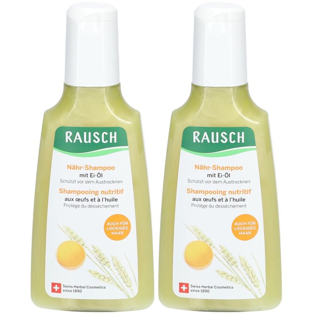 Zwei Flaschen RAUSCH Nähr-Shampoo mit Ei-Öl. Gelbe Flüssigkeit, weiße Verschlüsse. Abgebildet sind ein Ei und Weizenähren.