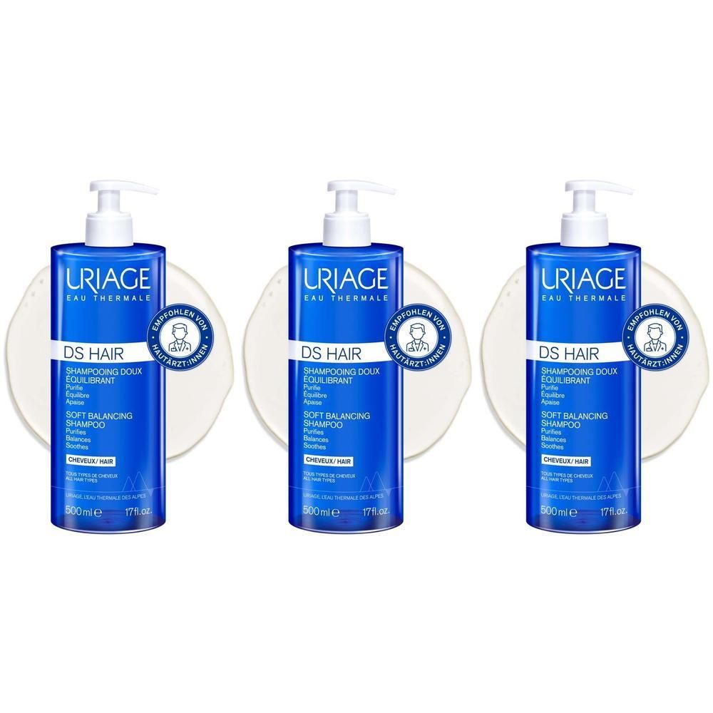 Drei Flaschen Uriage DS Hair Soft Balancing Shampoo mit Pumpspendern auf weißem Hintergrund.