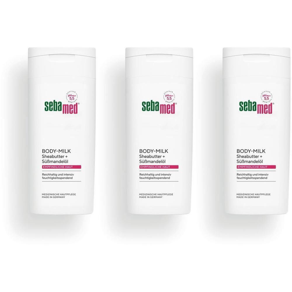 Drei Sebamed Body-Milk Flaschen mit Sheabutter und Süßmandelöl.
