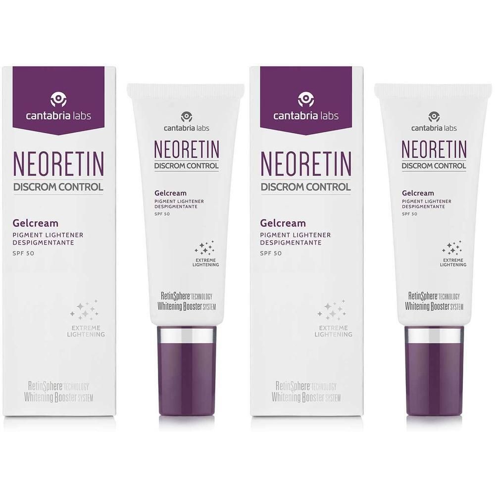 Vier Tuben und Kartons von Neoretin Discrom Control Gelcream SPF 50. Weiße Tuben mit lila Akzenten.