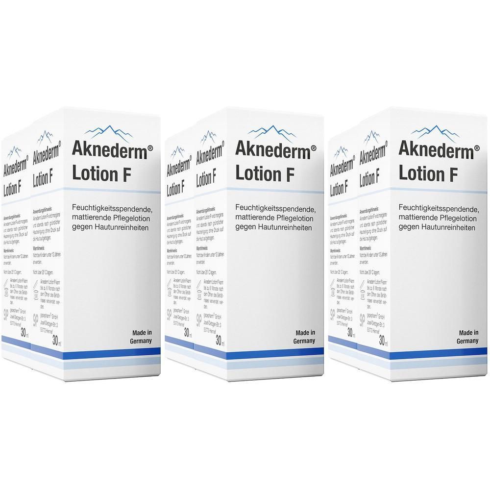 Drei Packungen Aknederm® Lotion F mit Beschriftung und Herstellerangaben.