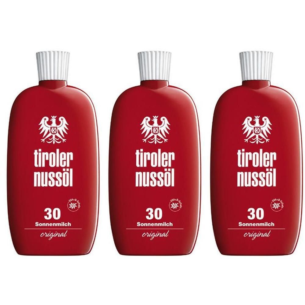 Drei rote Flaschen Tiroler Nussöl Sonnenmilch LSF 30.