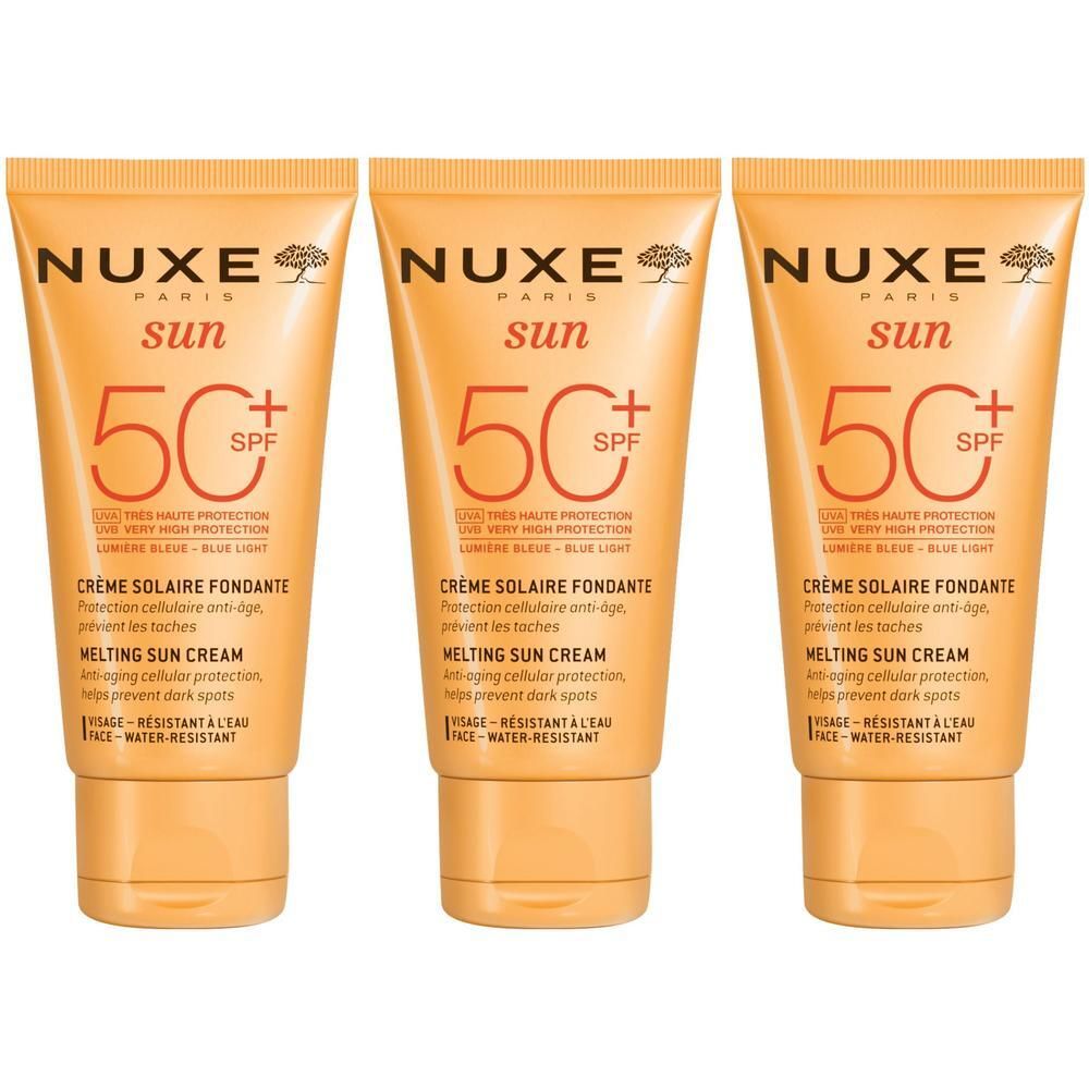 Drei Tuben Nuxe Sun Sonnencreme Gesicht LSF 50, orangefarben, mit Aufklappdeckel.