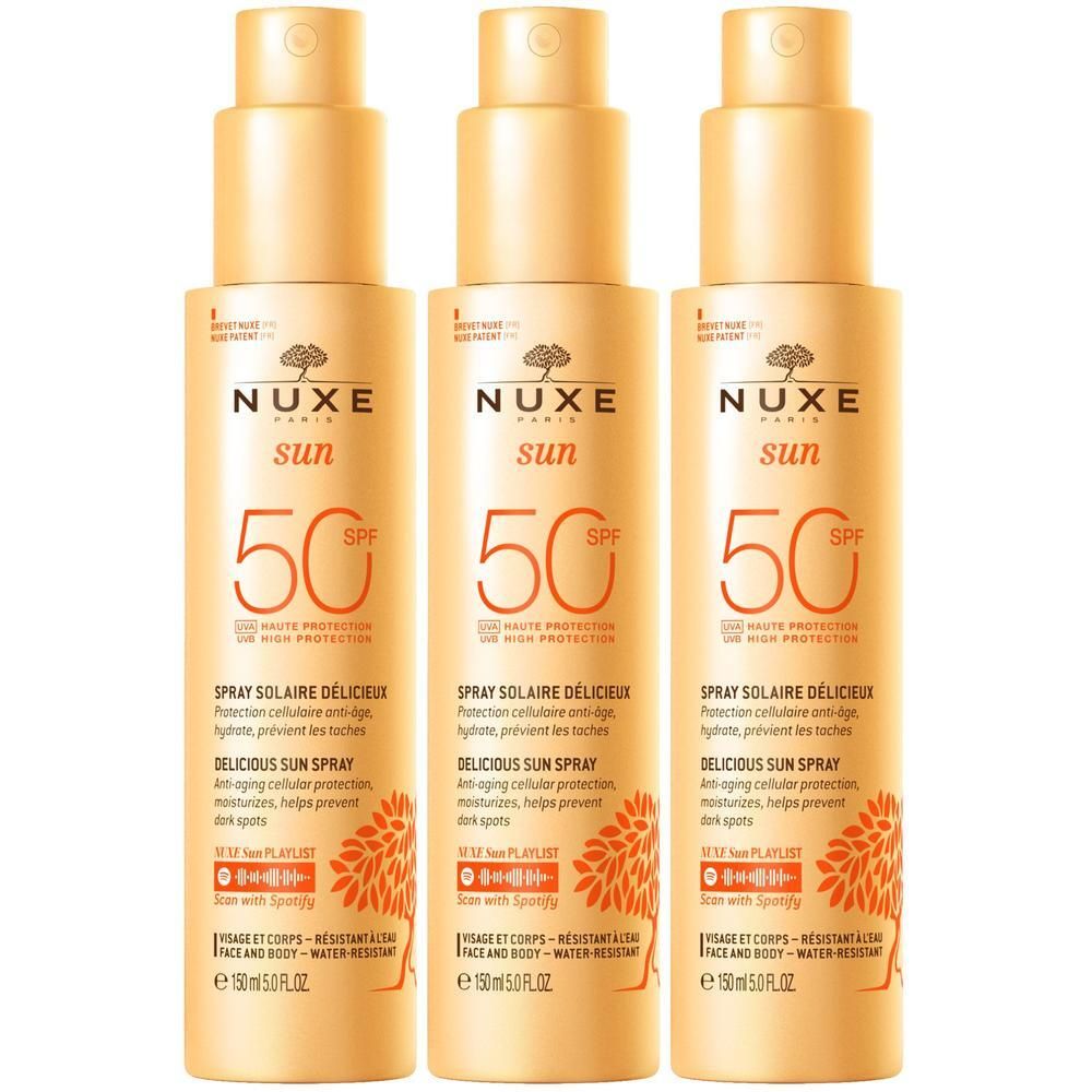Drei Flaschen Nuxe Sun Sonnenspray LSF 50 mit Zerstäuber.