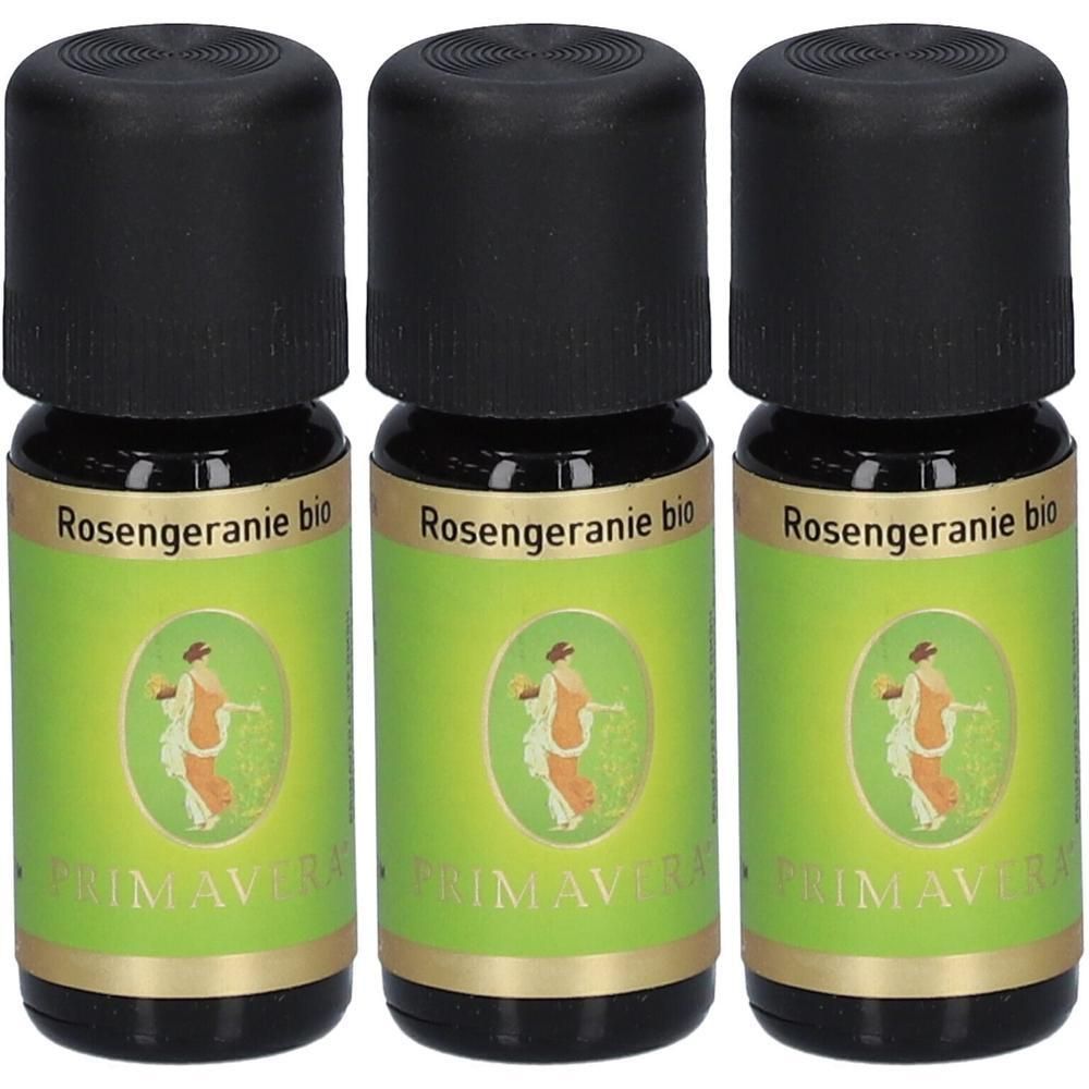 Drei kleine Glasflaschen mit schwarzem Deckel. Grüne Etiketten mit "Rosengeranie bio" und "PRIMAVERA".