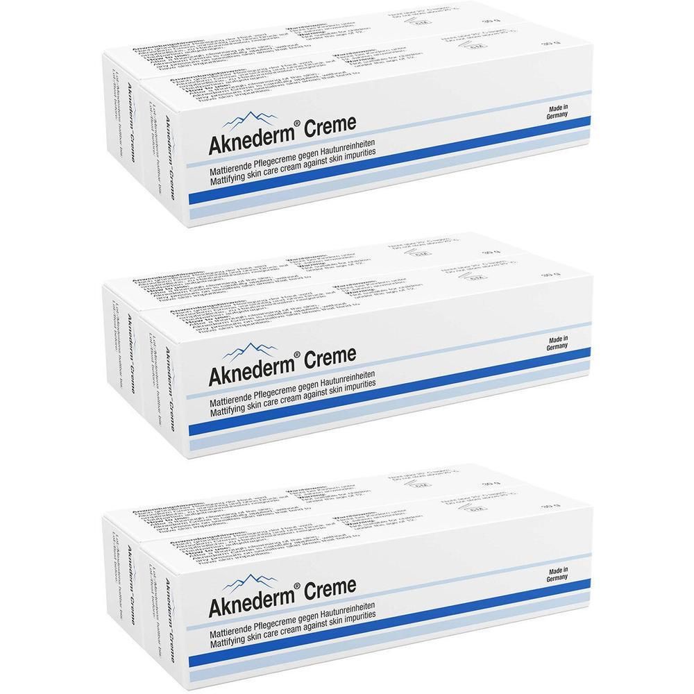 Drei Packungen Aknederm Creme mit Mattifying Skin Care Cream Aufschrift. Hergestellt in Deutschland.