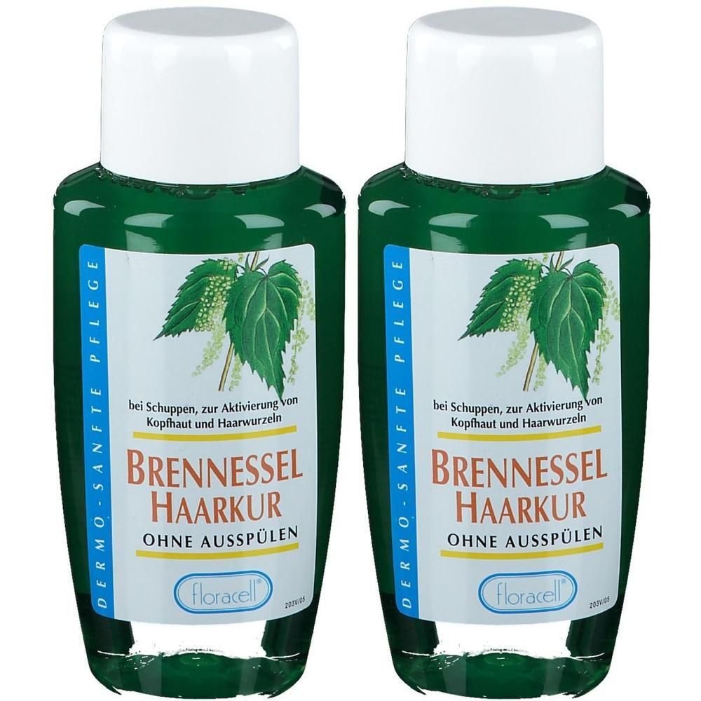 Zwei Flaschen Brennnessel Haarkur von Floracell mit Nesselmotiv.