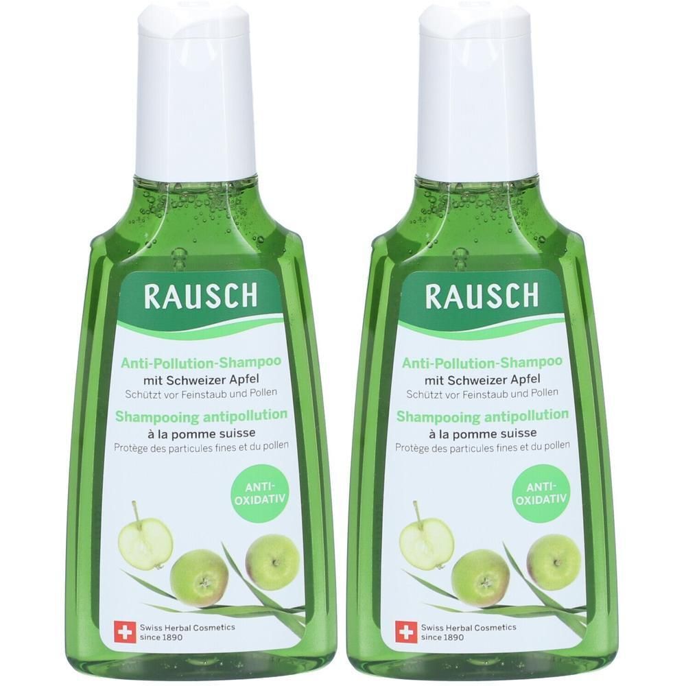 Zwei grüne Flaschen RAUSCH Anti-Pollution-Shampoo mit Schweizer Apfel. Mit "ANTI-OXIDATIV" Aufschrift.