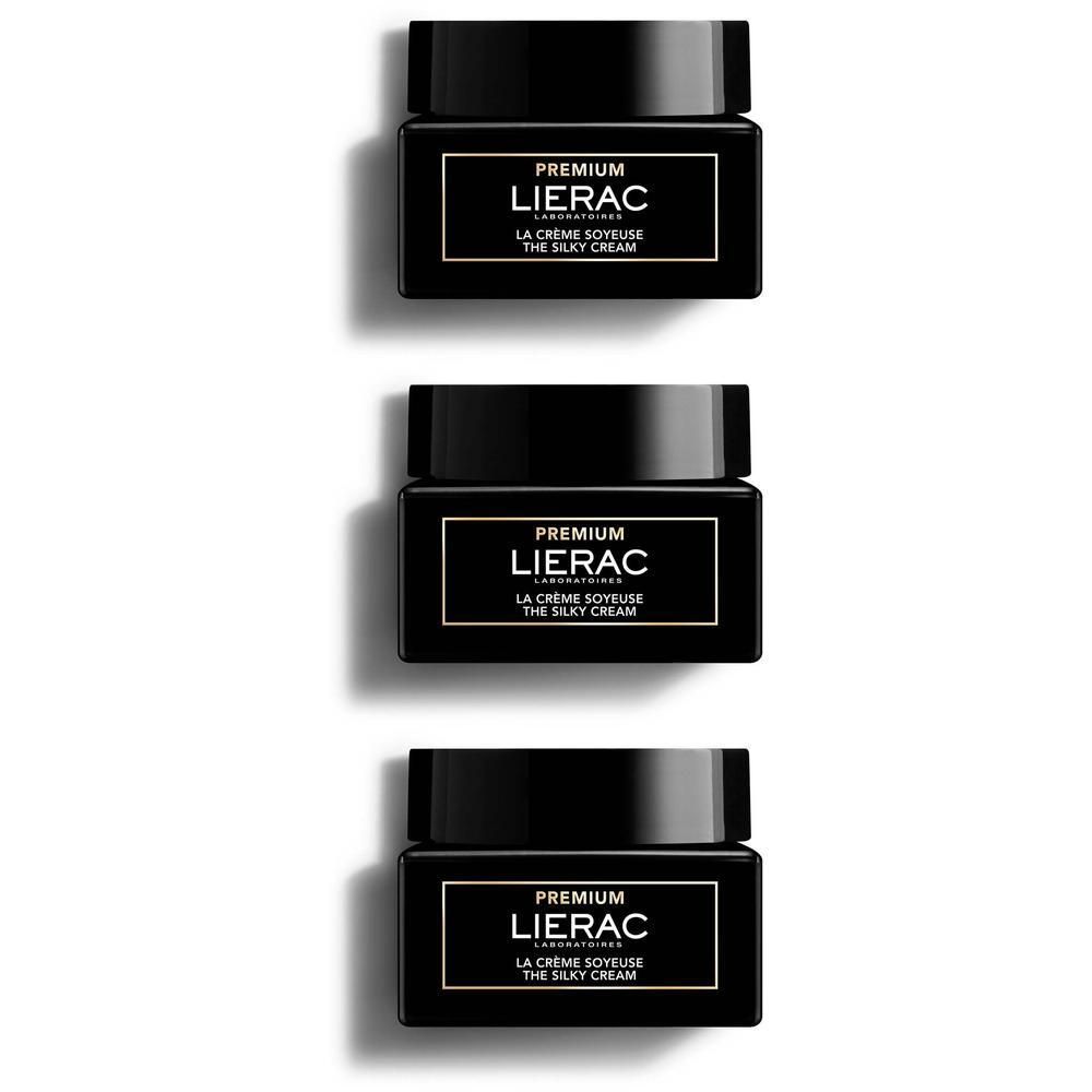 Drei LIERAC Premium Seidige Creme Tiegel nebeneinander auf weißem Hintergrund.