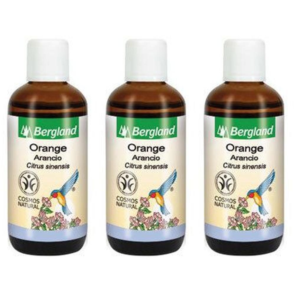 Drei Flaschen Bergland Orangenöl mit Etiketten, die Vögel und Blumen zeigen.