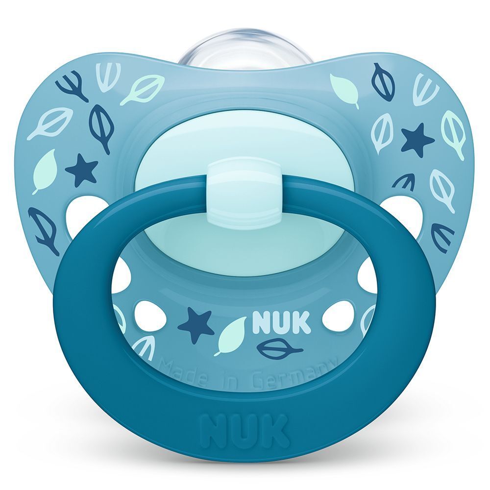 NUK Signature Schnuller 18-36 Monate in Blau mit Blättermuster.