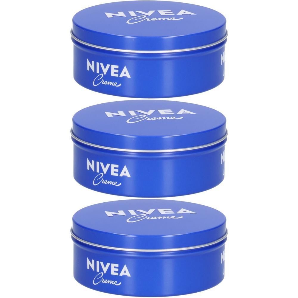 Drei blaue NIVEA Creme Dosen mit silbernem Rand und weißem Schriftzug.