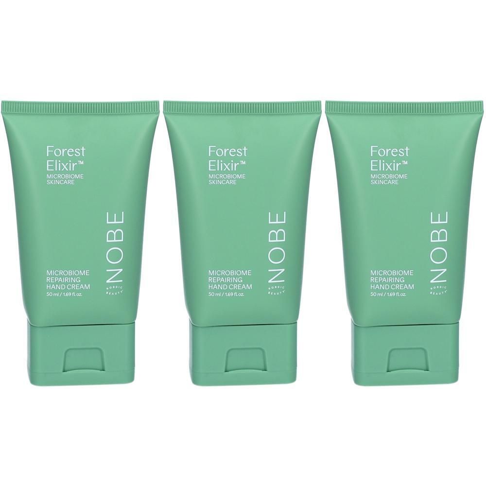 Drei grüne Tuben NOBE Forest Elixir Mikrobiom Reparierende Handcreme.