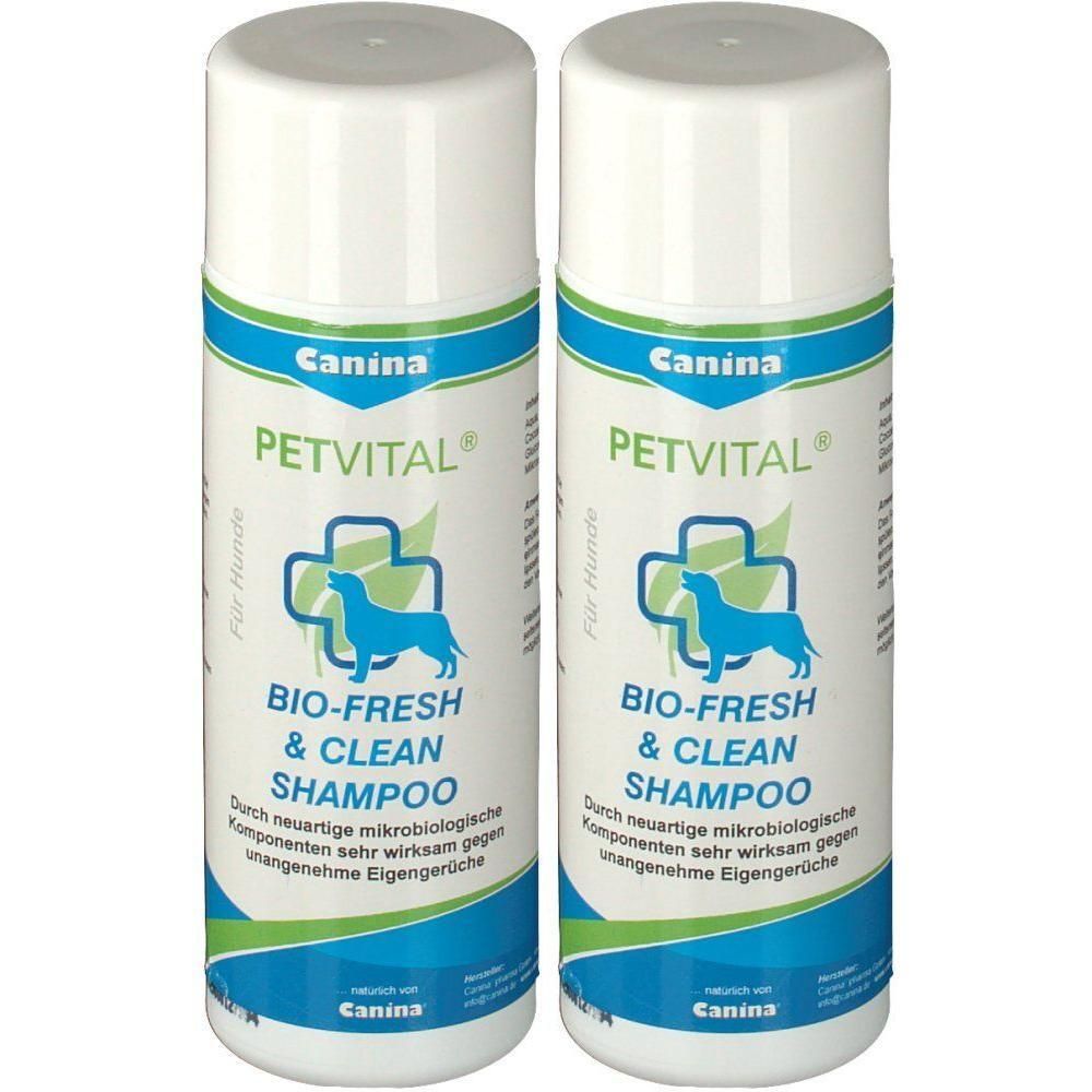Zwei weiße Flaschen Canina PETVITAL Bio-Fresh & Clean Shampoo mit blau-grünem Etikett und Hundesymbol.