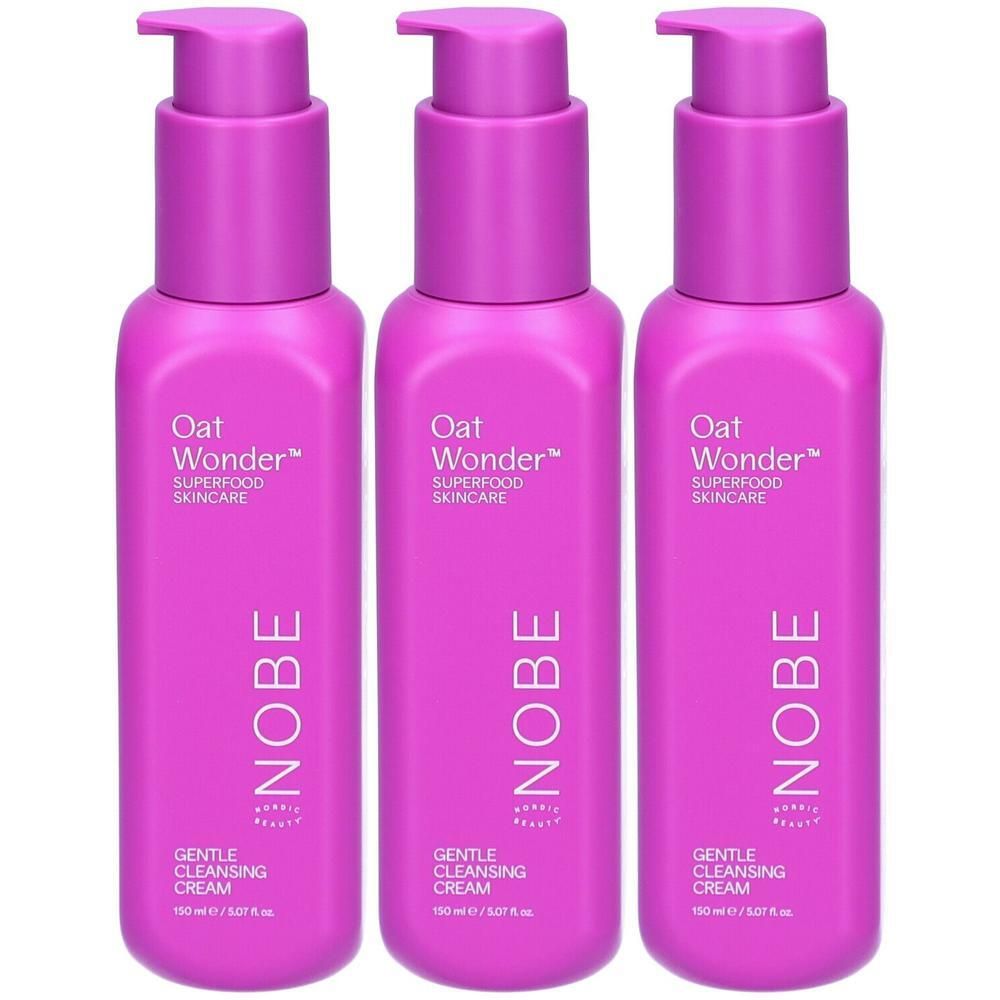 Drei Flaschen NOBE Oat Wonder Sanfte Reinigungscreme in Pink mit Pumpspendern.