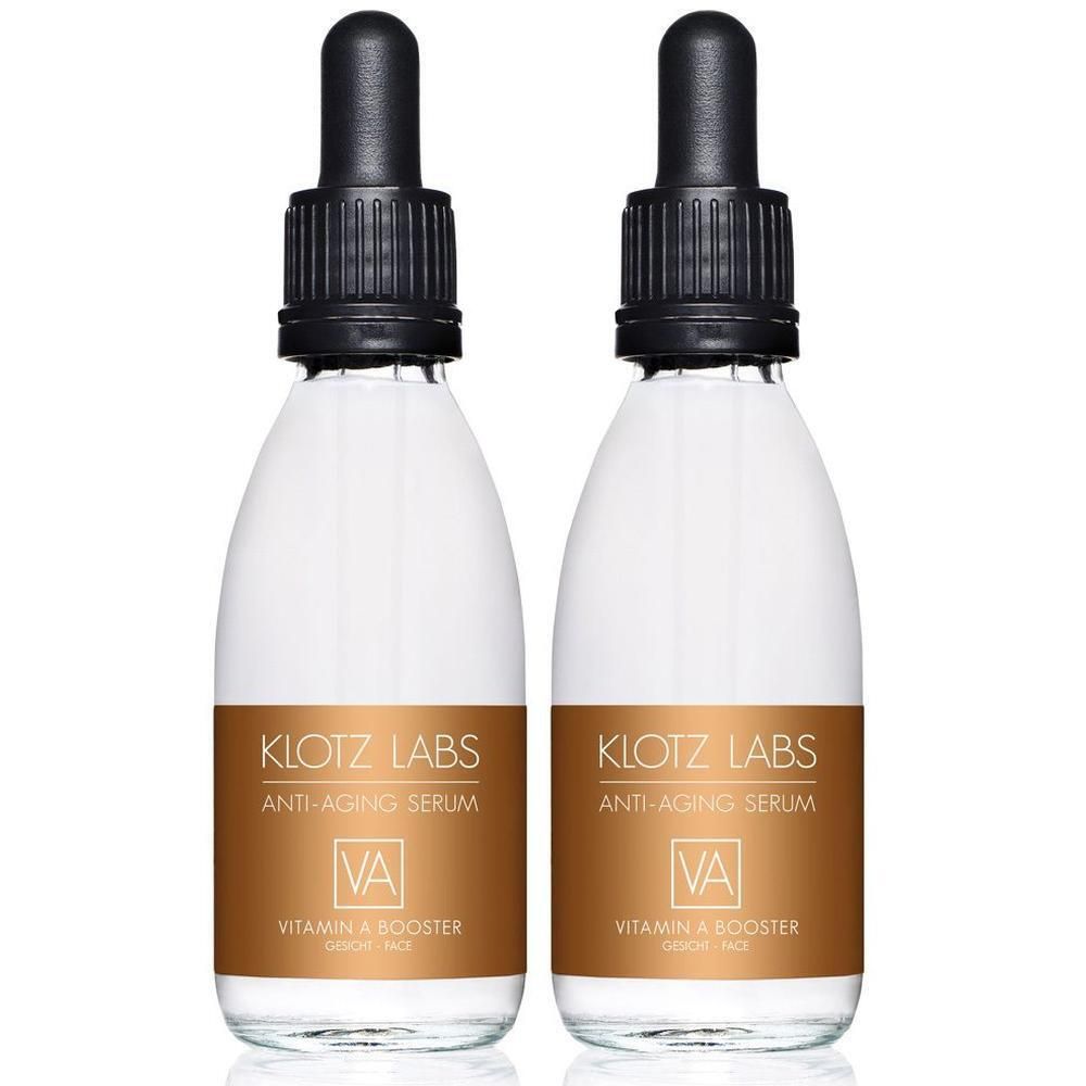 Zwei Glasflaschen mit Pipettenverschluss, gefüllt mit Vitamin A Booster Anti-Aging Serum von Klotz Labs.