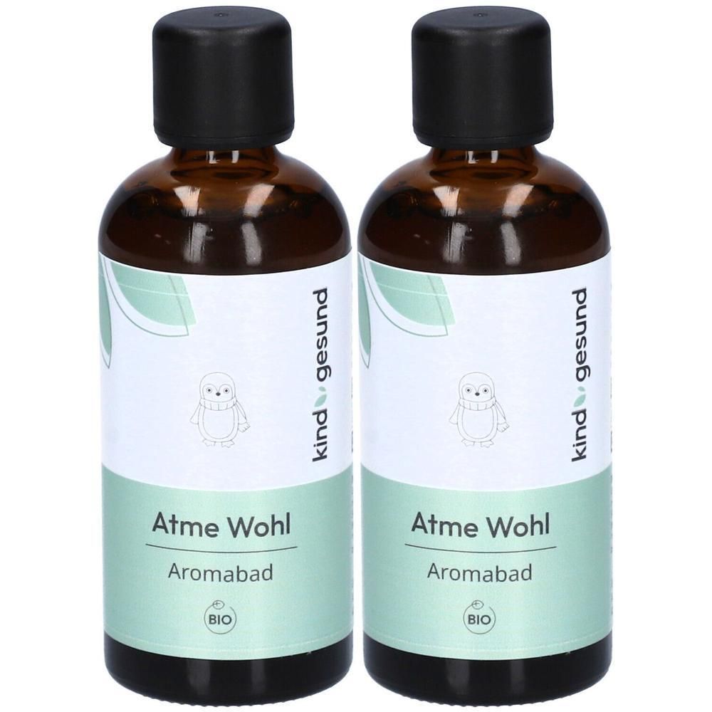 Zwei Flaschen Bio-Atme Wohl Aromabad mit schwarzem Deckel und Etikett mit Pinguin-Motiv.