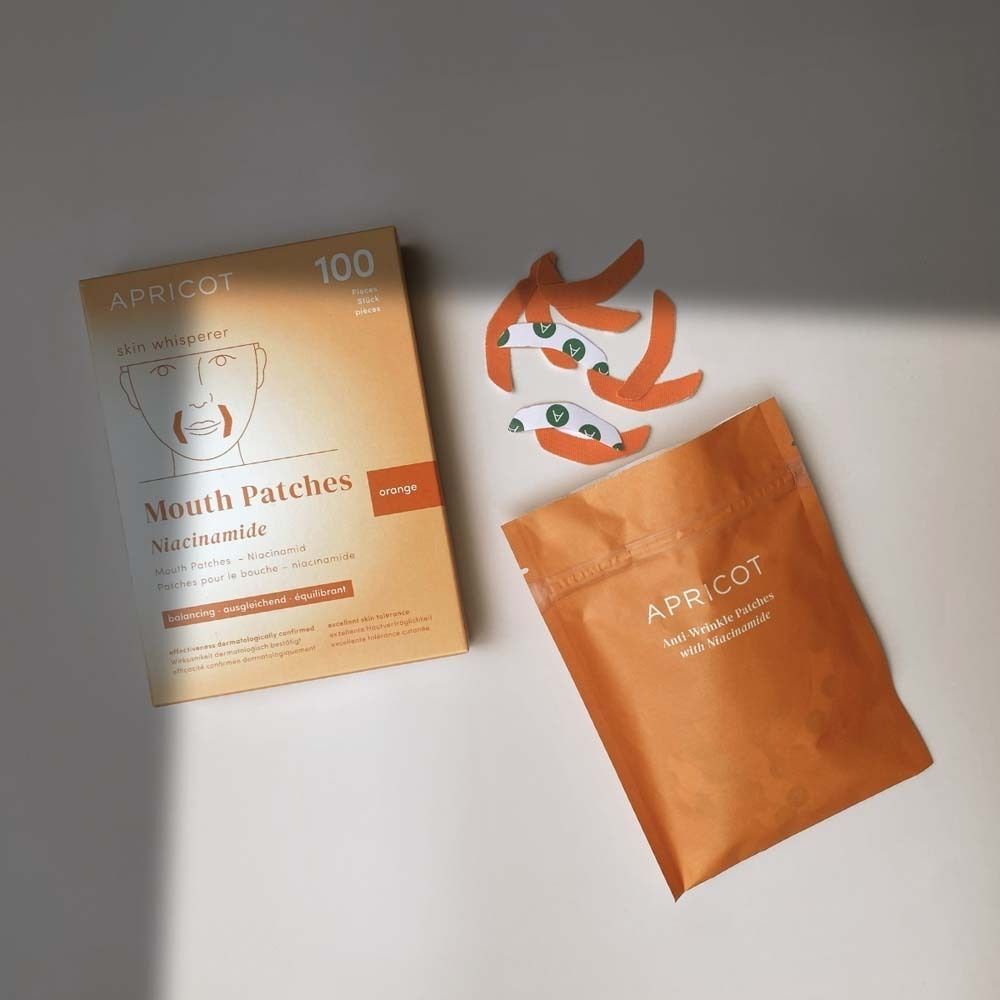 APRICOT Mund Patches Niacinamid Packung, Pouch und einzelne Patches.