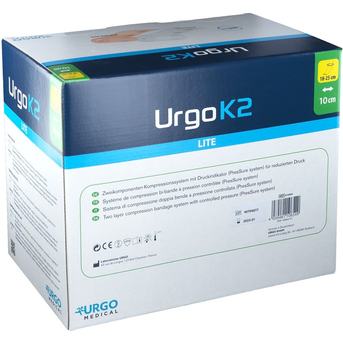 Karton von UrgoK2 Lite. Aufdruck: Urgo Medical, 18-25 cm x 10 cm. Enthält ein Zweikomponenten-Kompressionssystem. Text in Deutsch, Englisch, Französisch, Italienisch.