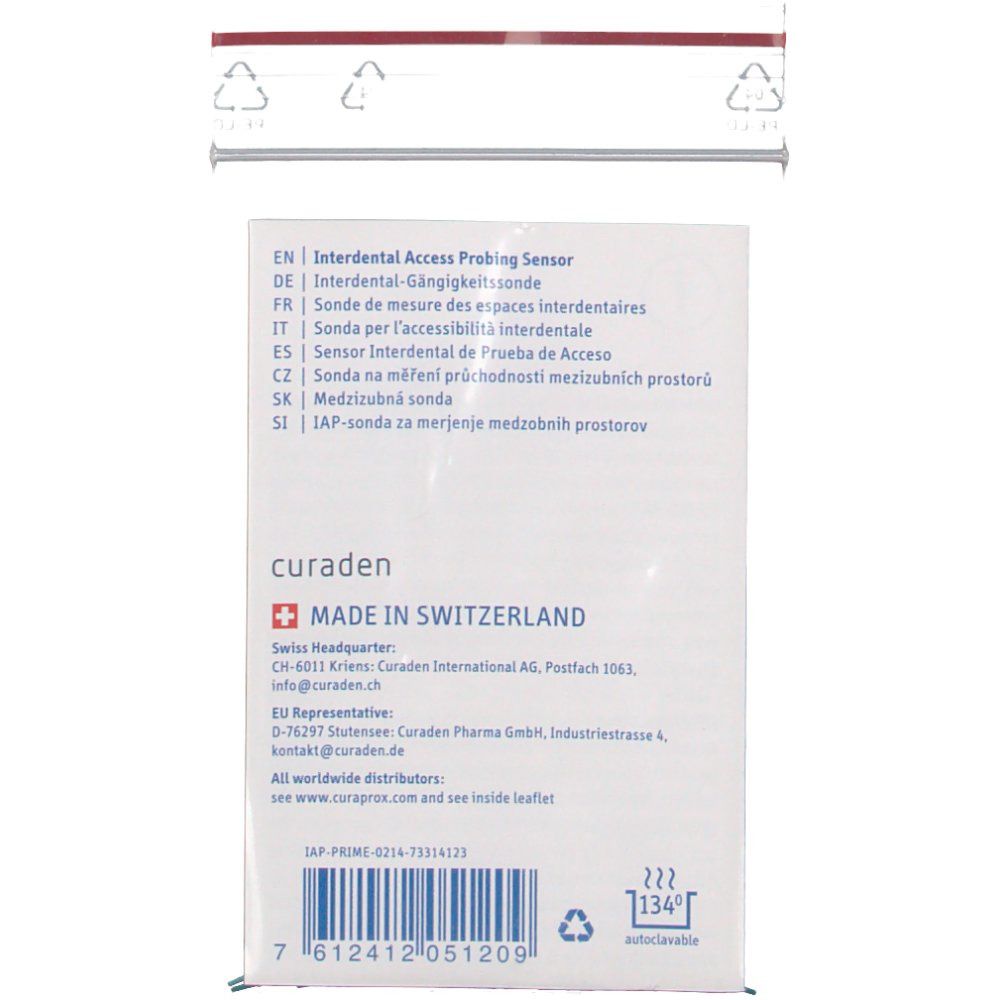 Rückseite der Verpackung mit Text in verschiedenen Sprachen. CURADEN-Logo. Hergestellt in der Schweiz. Barcode.