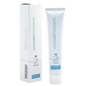 Weiße Tube und Schachtel. Aufschrift GOLDNERZ COSMETIC, Hautcreme extra. Logo mit Vogel.